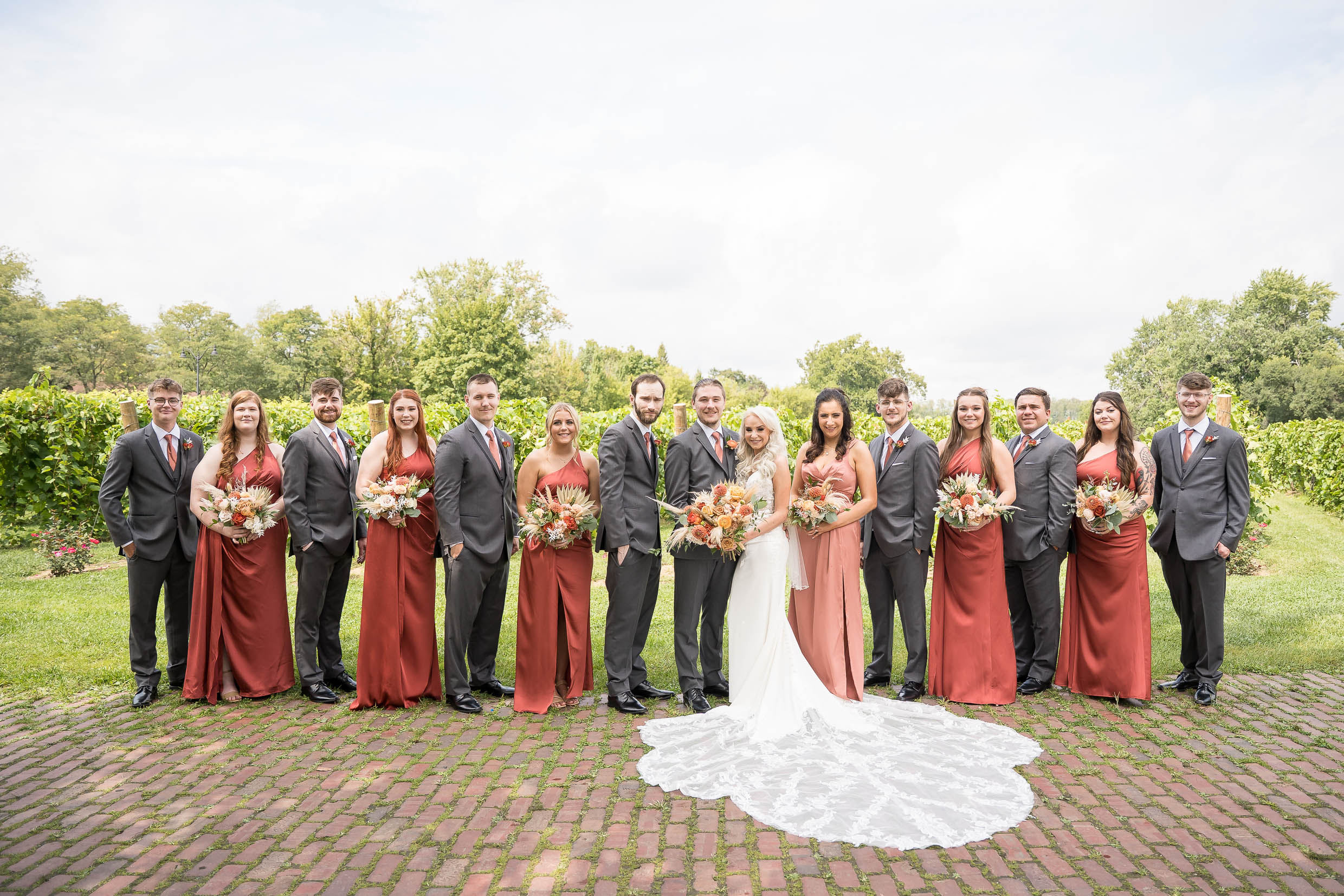 Wedding party photos at Gervasi Vineyard with vineyard views. Canton Ohio Wedding.