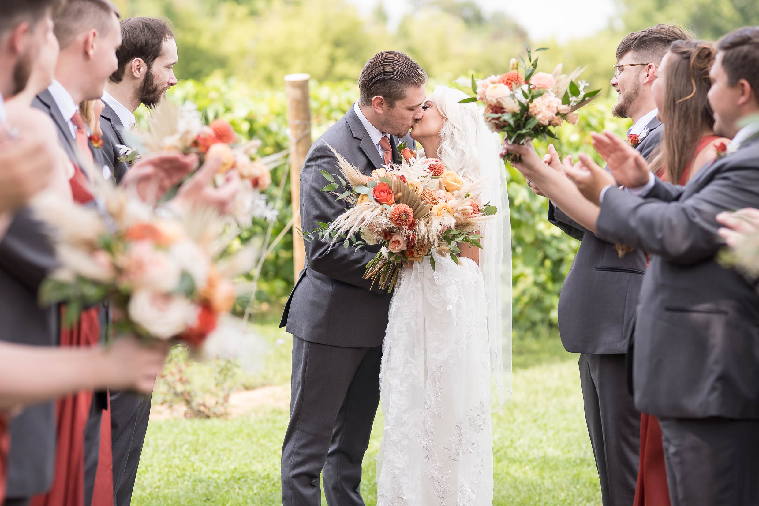 Wedding party photos at Gervasi Vineyard with vineyard views. Canton Ohio Wedding.