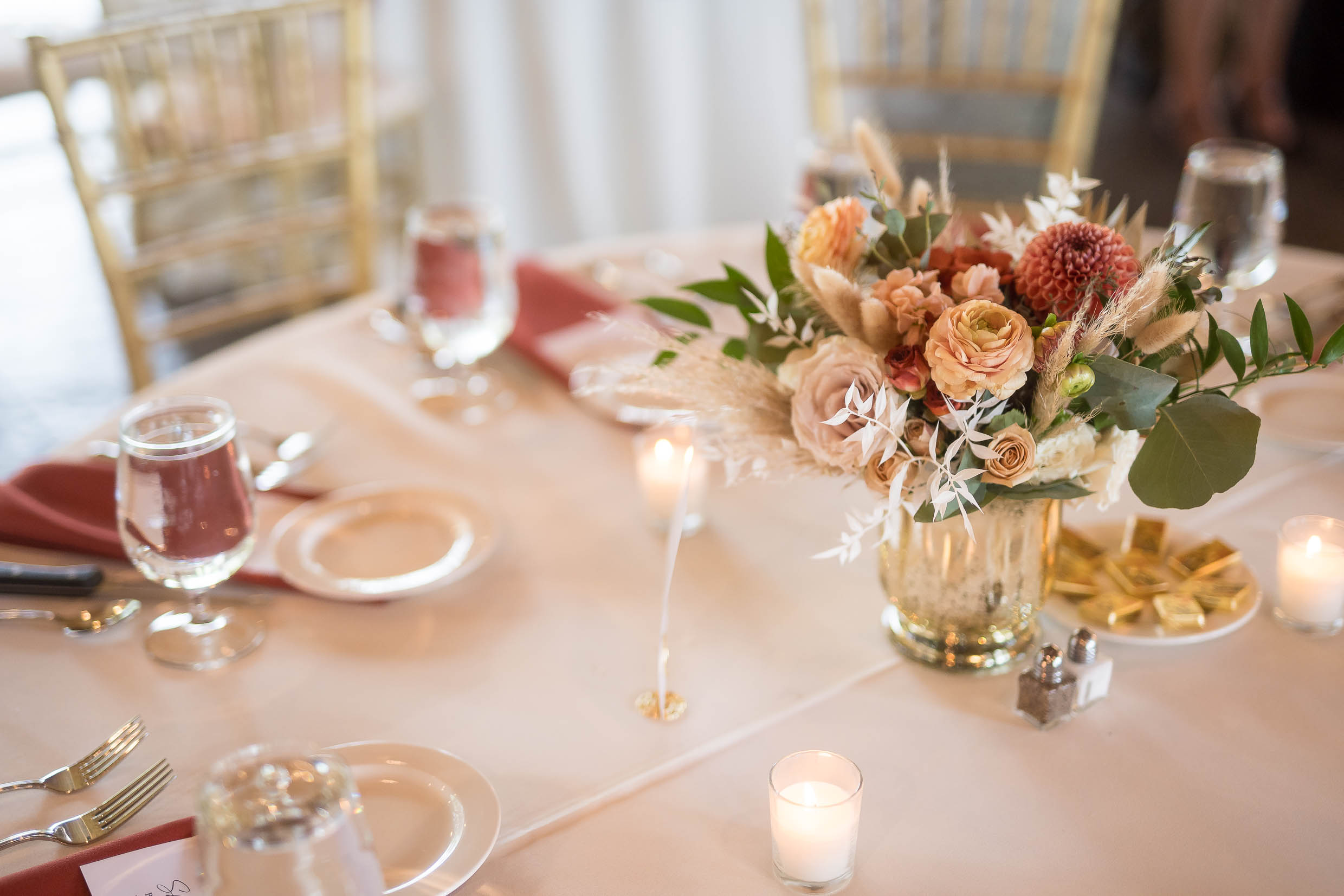 Wedding reception setup in The Pavilion at Gervasi Vineyard with romantic decor