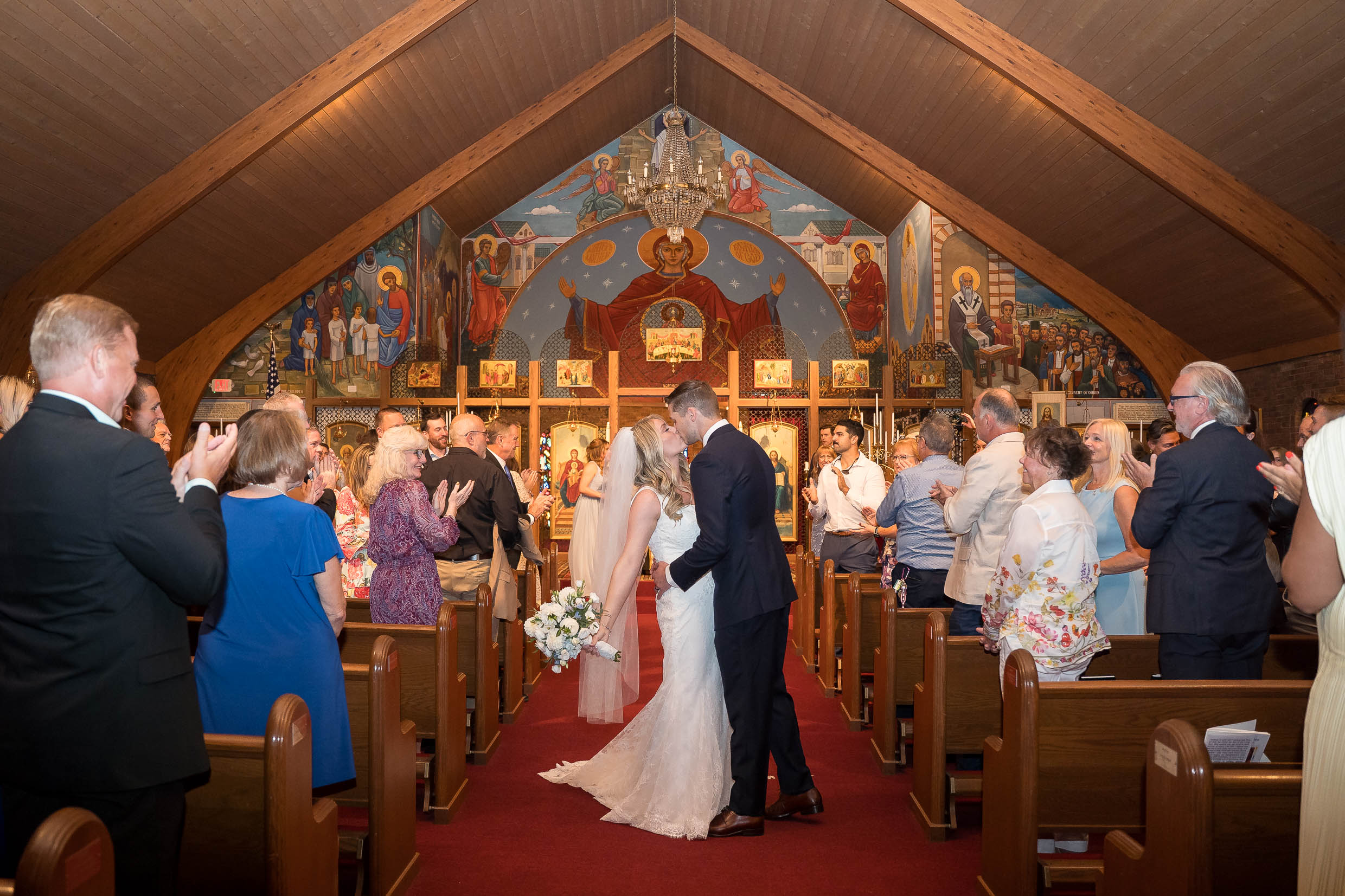 Orthodox wedding ceremony at a church in Akron before the reception at Portage Country Club.